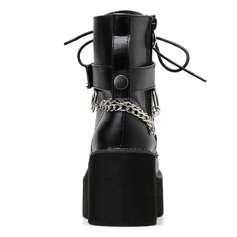 Women's gothic black PU leather ankle boots with lace-up design and chain detailing, perfect for autumn fashion.