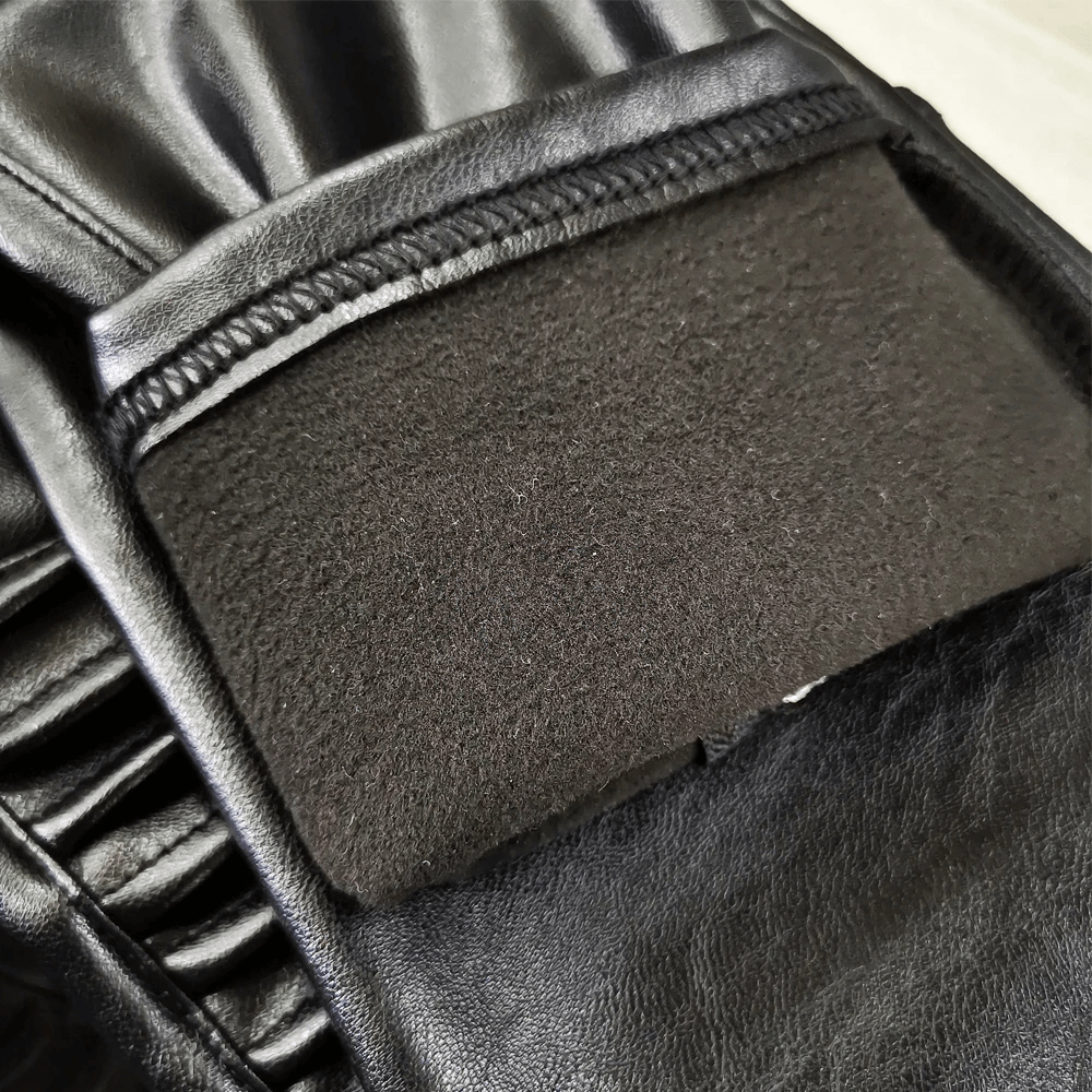 Close-up of the inside fabric of women's PU leather biker pants, showcasing a soft, comfortable lining.