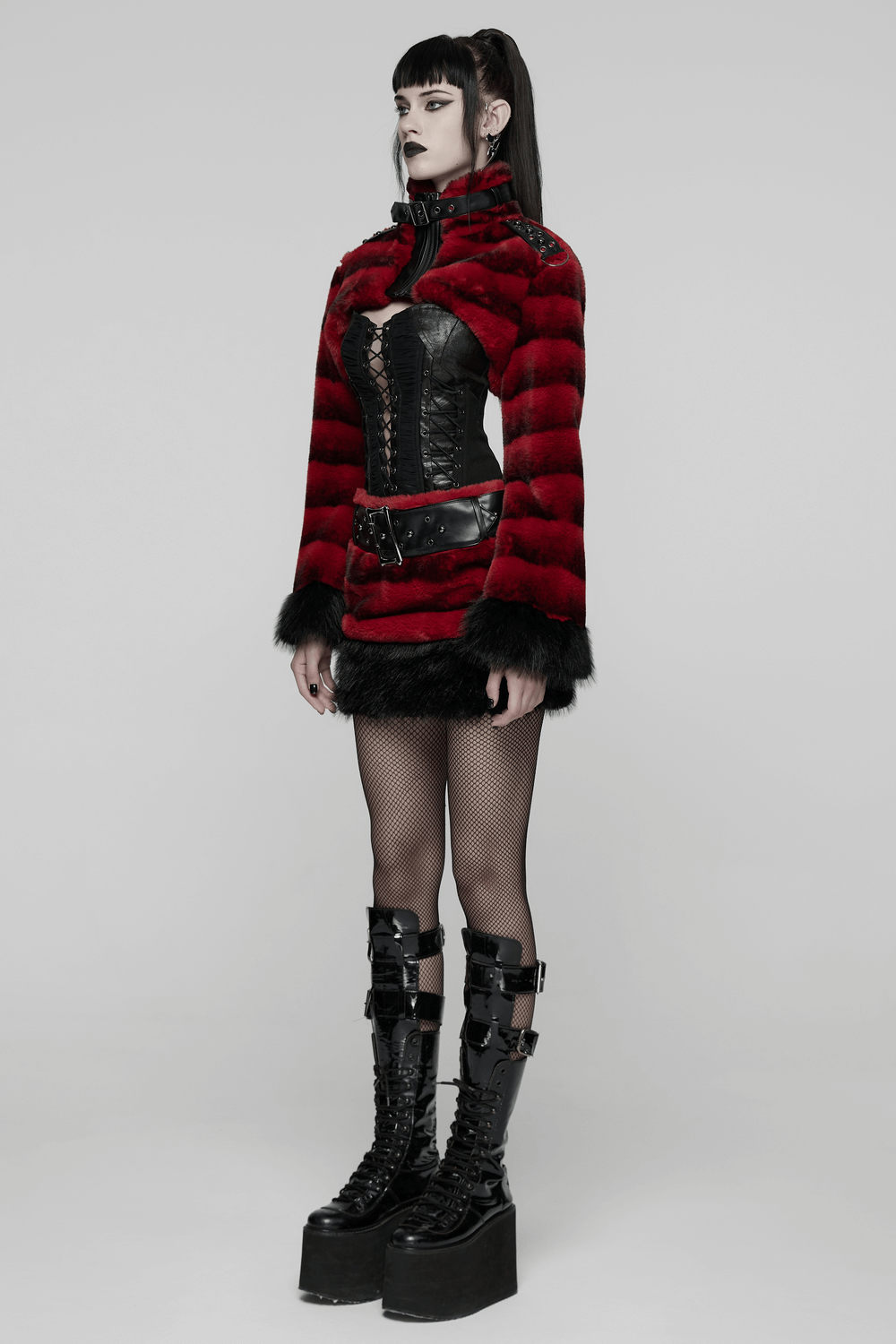 Women's Punk Faux Fur Cropped Jacket with Cuffs worn by a model in a stylish punk outfit featuring edgy details.