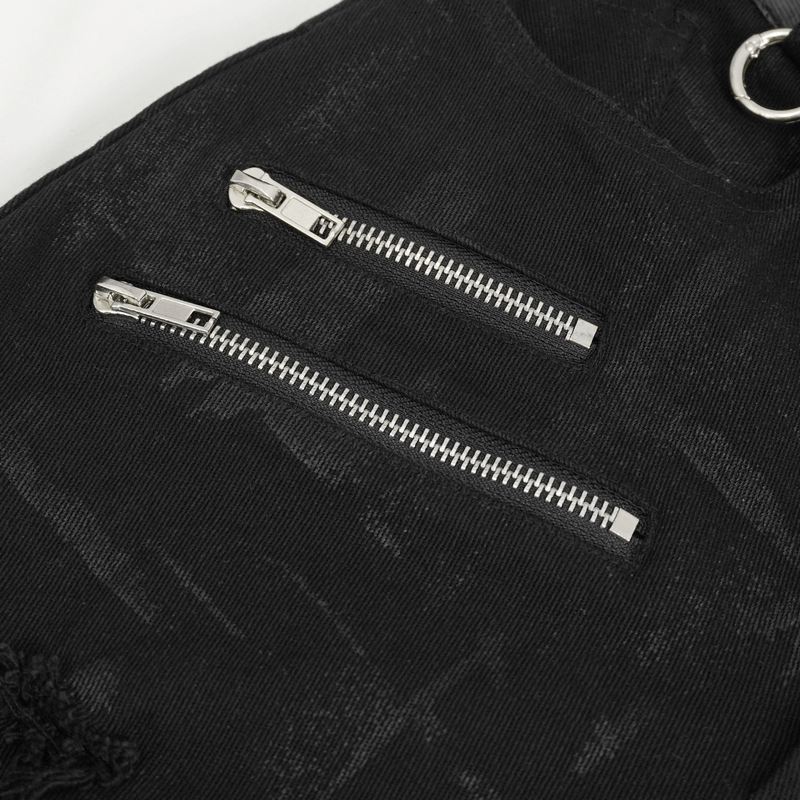 Close-up of two silver zippers on black punk-style high-waisted pants, showcasing edgy design details.