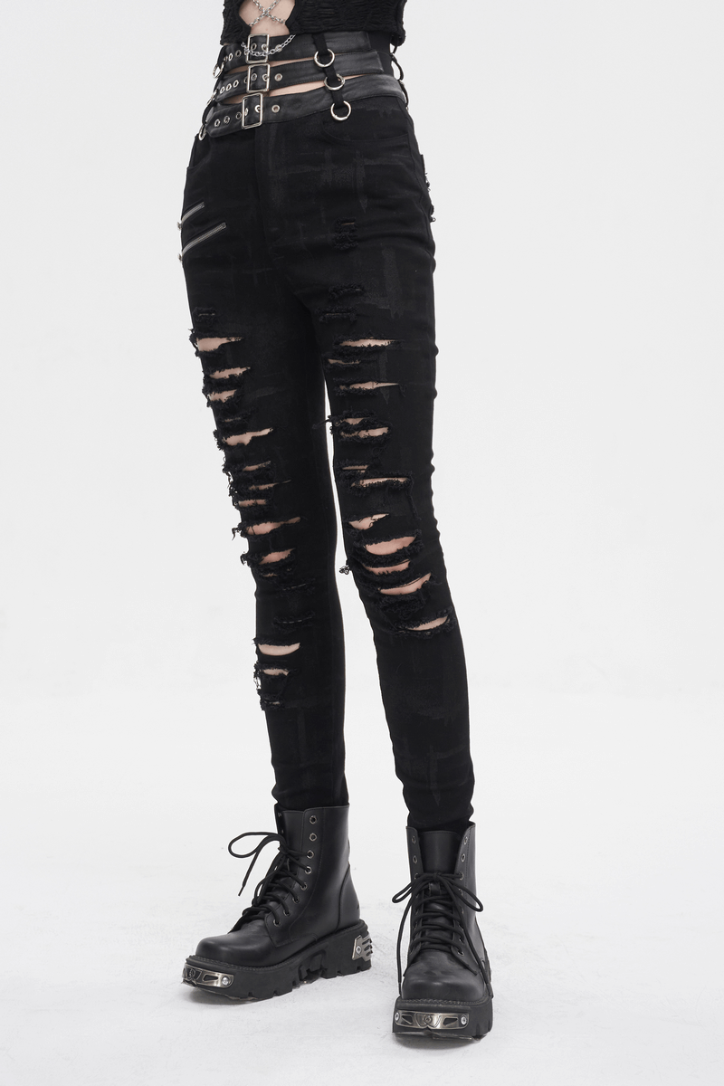 Edgy women's punk high-waisted ripped pants with multi-buckles, paired with black combat boots for bold style.