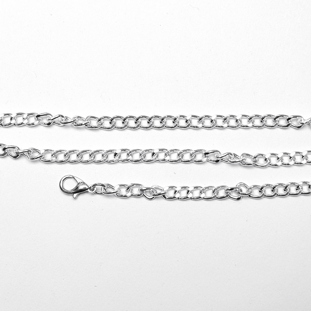 Silver alloy chains for punk multilayered body harness with skulls and spikes.