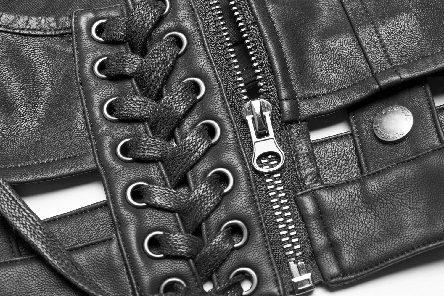 Close-up of women's punk PU leather corset showcasing lace-up detail and metal zipper for edgy fashion.