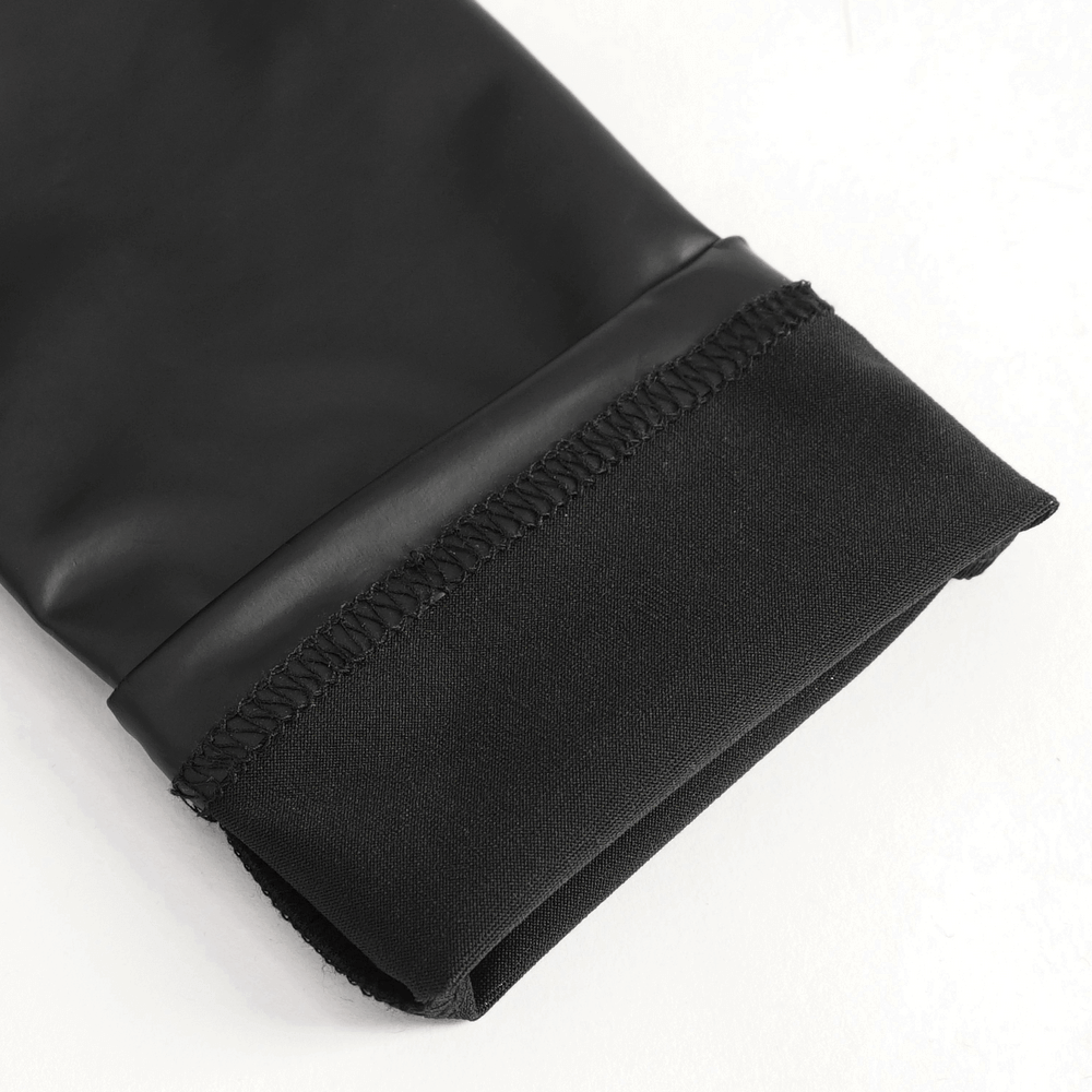 Close-up of sleek black faux leather pant cuff with stitching details, showcasing punk fashion style.