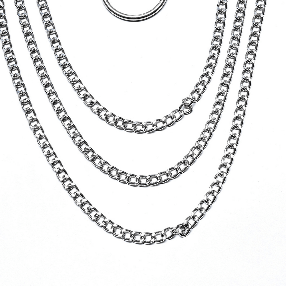Silver metal chains in layered design showcasing edgy and bold style, perfect for statement jewelry pieces.