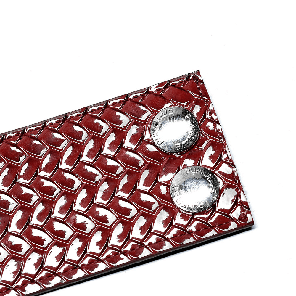 Close-up of red python grain choker featuring silver metal snaps, highlighting a punk rock aesthetic.