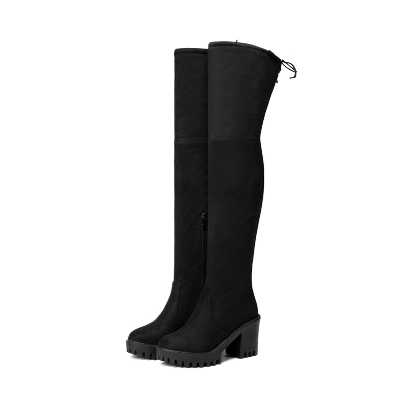 Stylish women's black over-the-knee platform boots with chunky heels, perfect for trendy casual outfits.