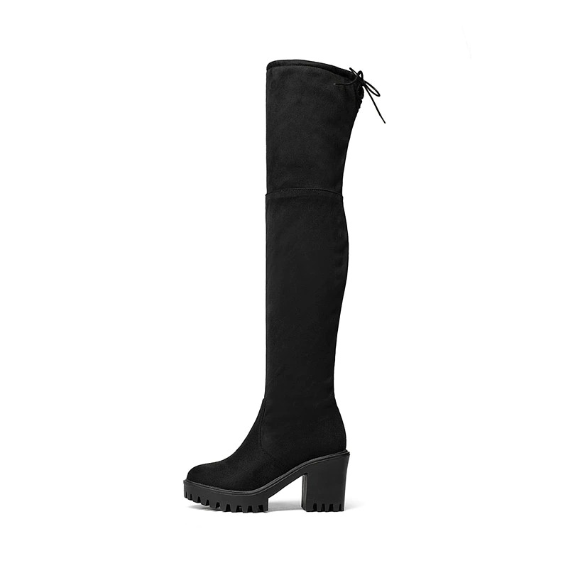 Women's black thigh-high round toe platform boots with modern design and chunky heels.
