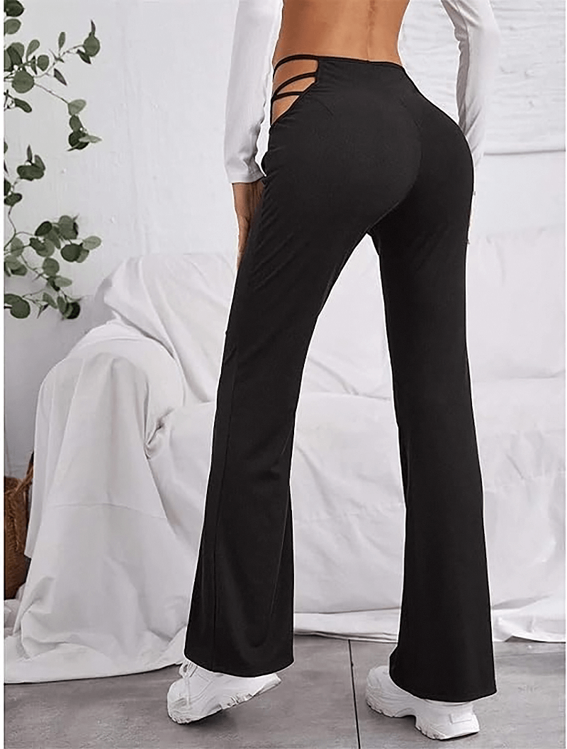 Back view of women's sexy high waist pants with hollow-out details and flared legs, perfect for alternative fashion styling.