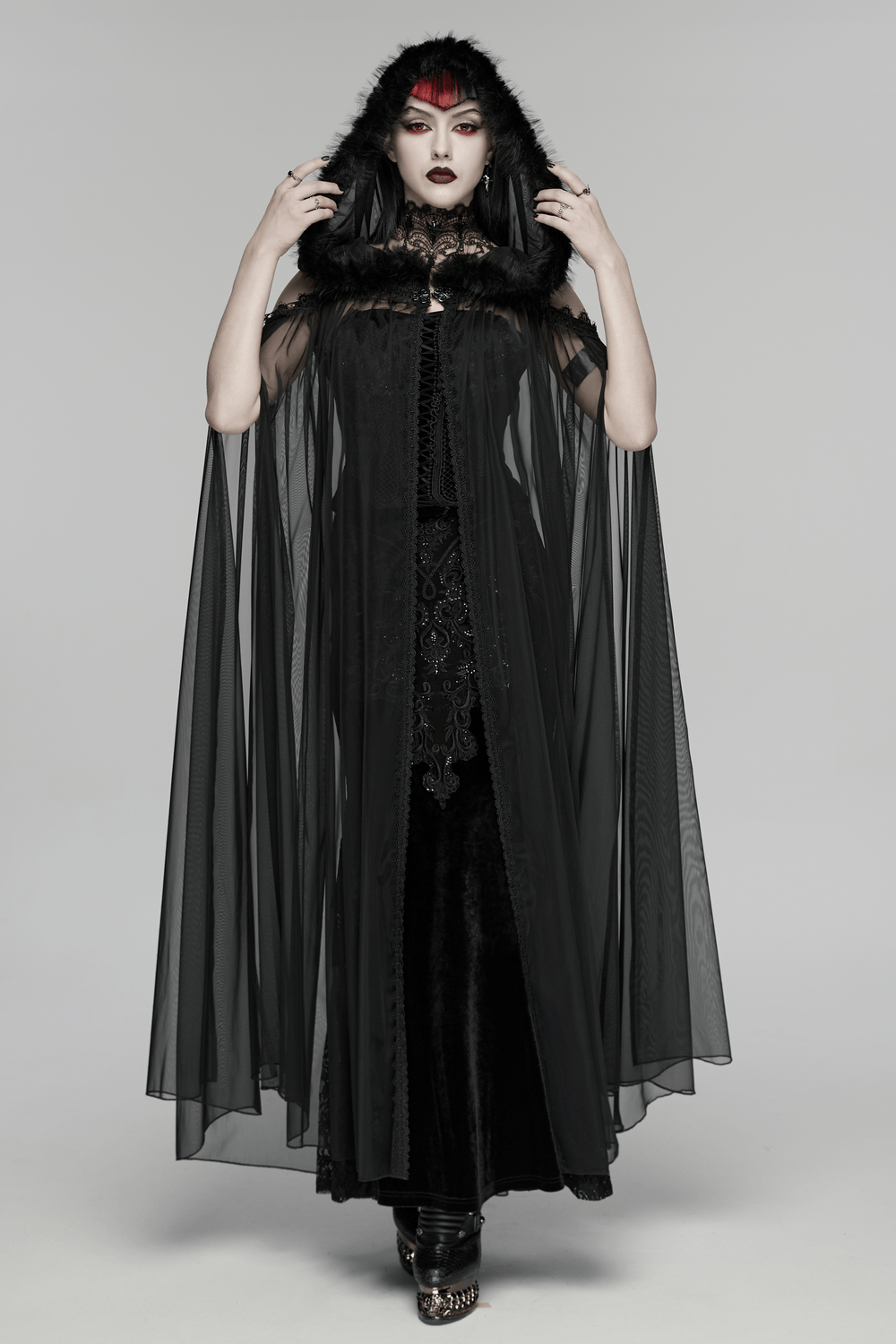 Women's Sheer Gothic Hooded Mesh Ritual Cloak displayed on model, featuring a hood and luxurious fur trim.