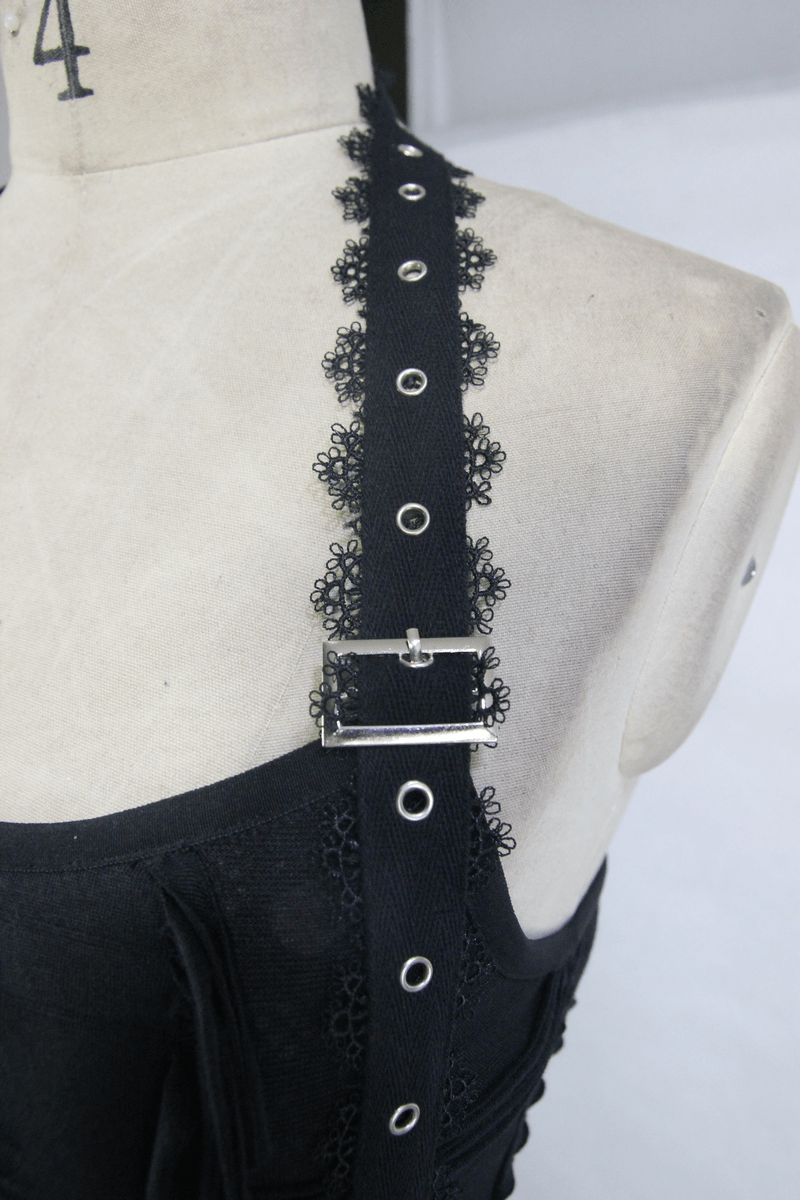 Close-up of black sleeveless maxi dress strap with eyelet detailing and buckle, showcasing gothic style elegance.