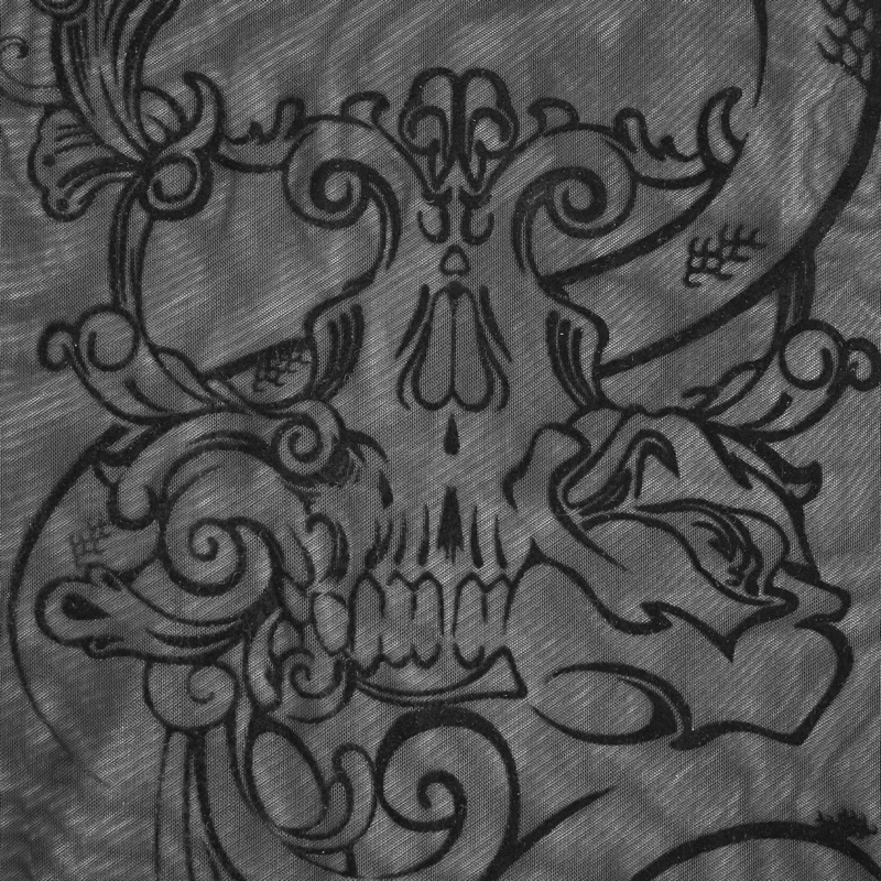 Gothic skull design on black fabric, showcasing intricate swirls and artistic details for a punk vibe.