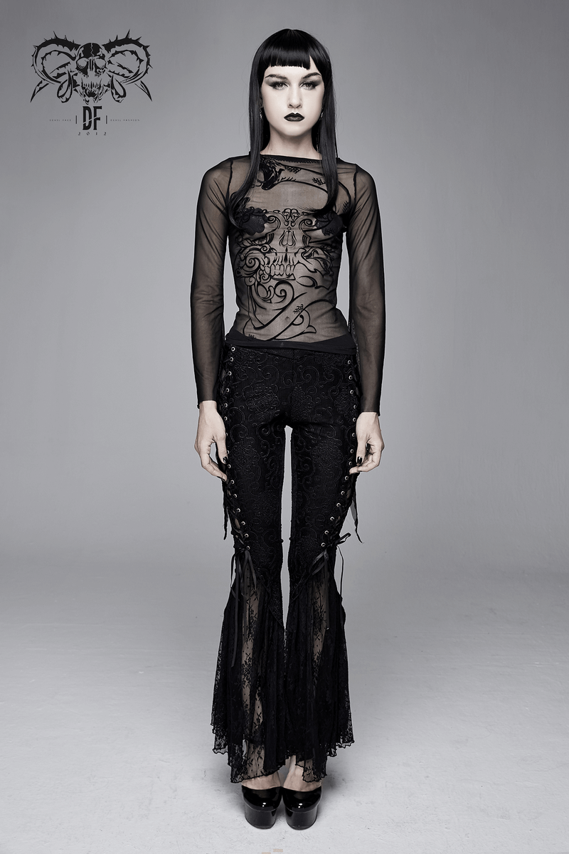 Trendy women's gothic mesh top with long sleeves paired with stylish black pants, showcasing a unique fashion statement.