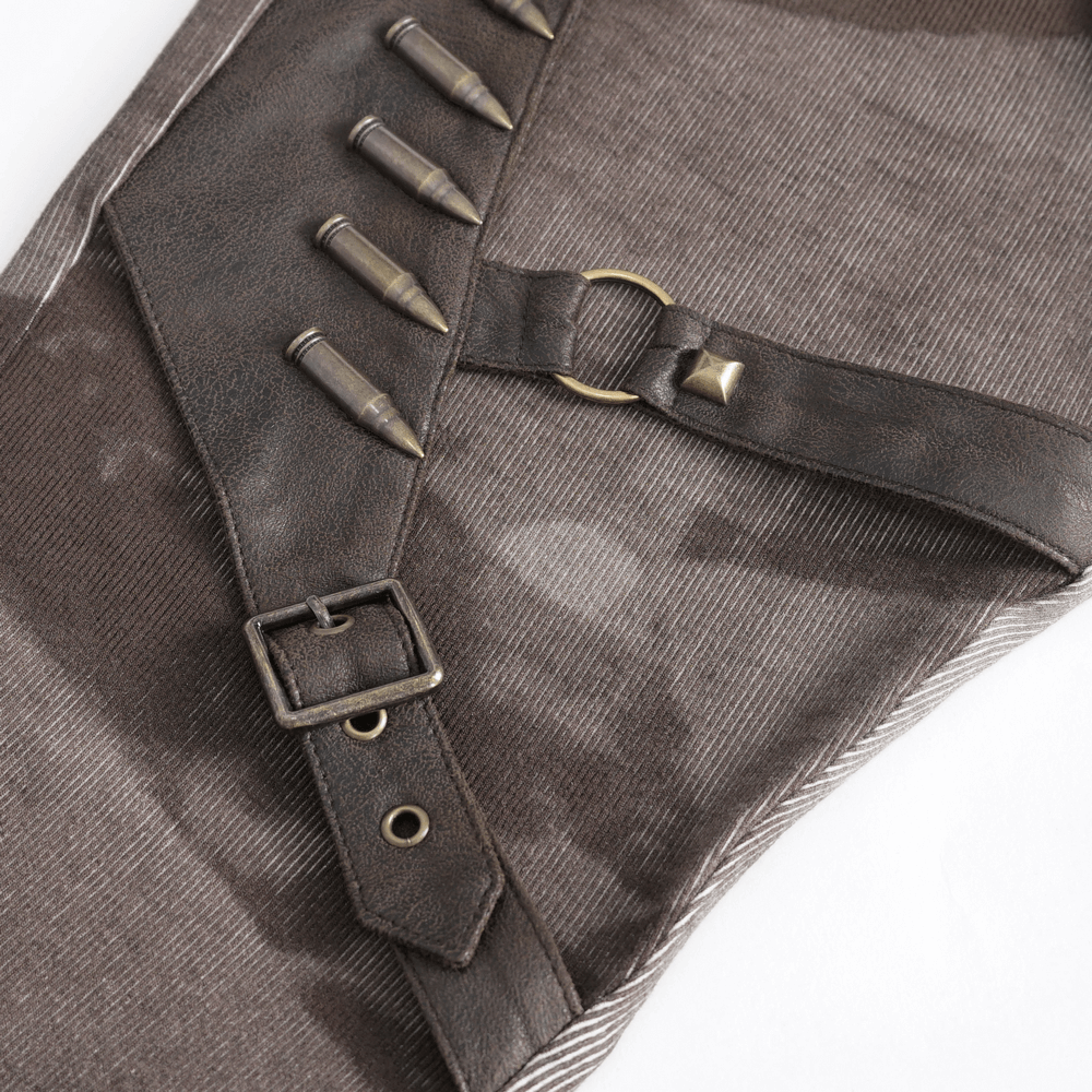 Close-up of steampunk style leggings showing lace-up details and decorative bullet accents.