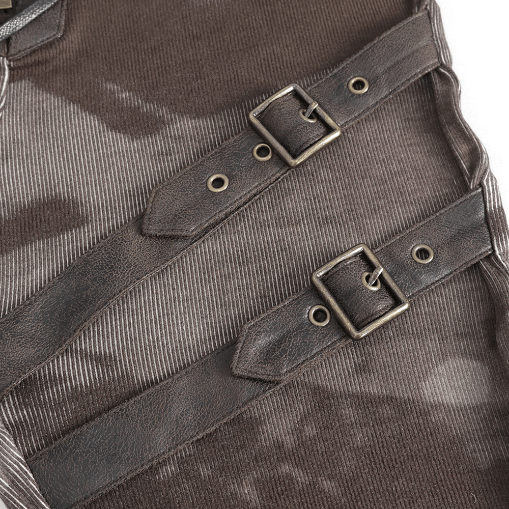 Close-up of brown steampunk-style fabric straps with buckles, showcasing unique corset design details.
