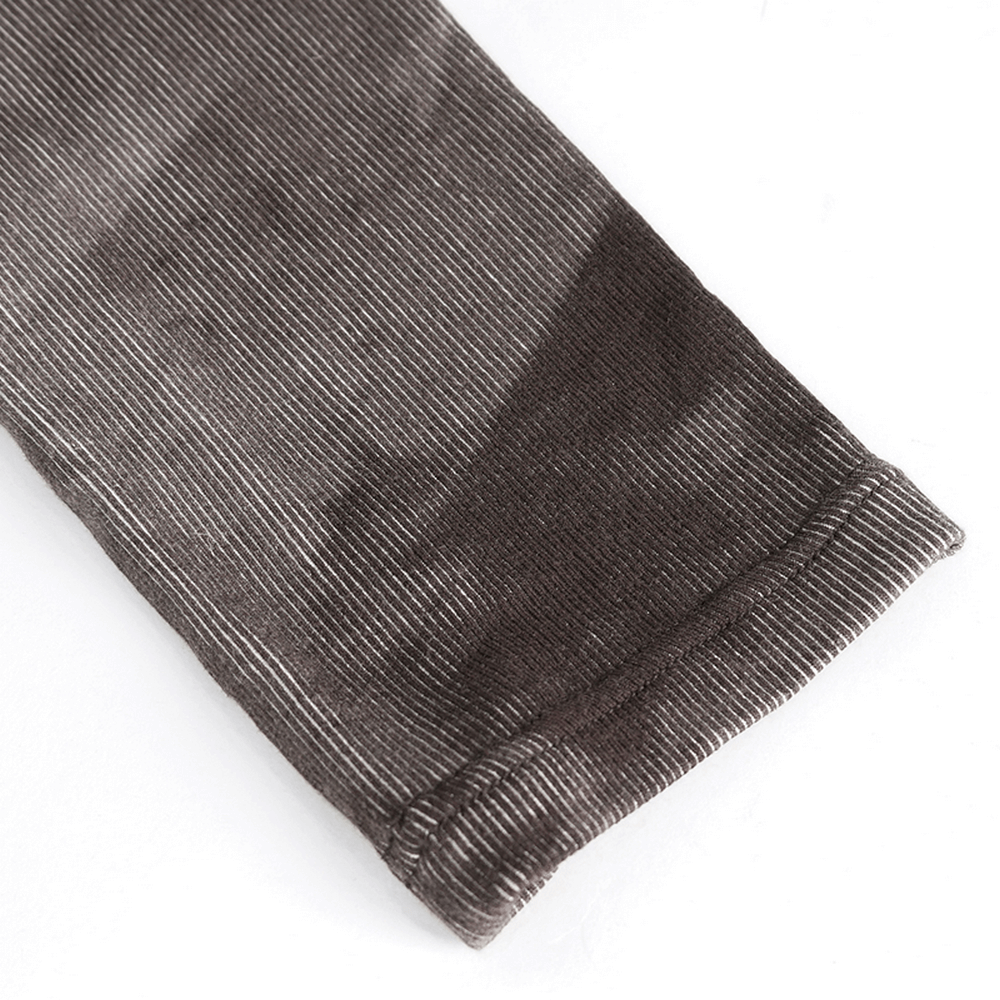 Close-up of women's steampunk striped leggings showcasing lace-up detailing and stylish hem.