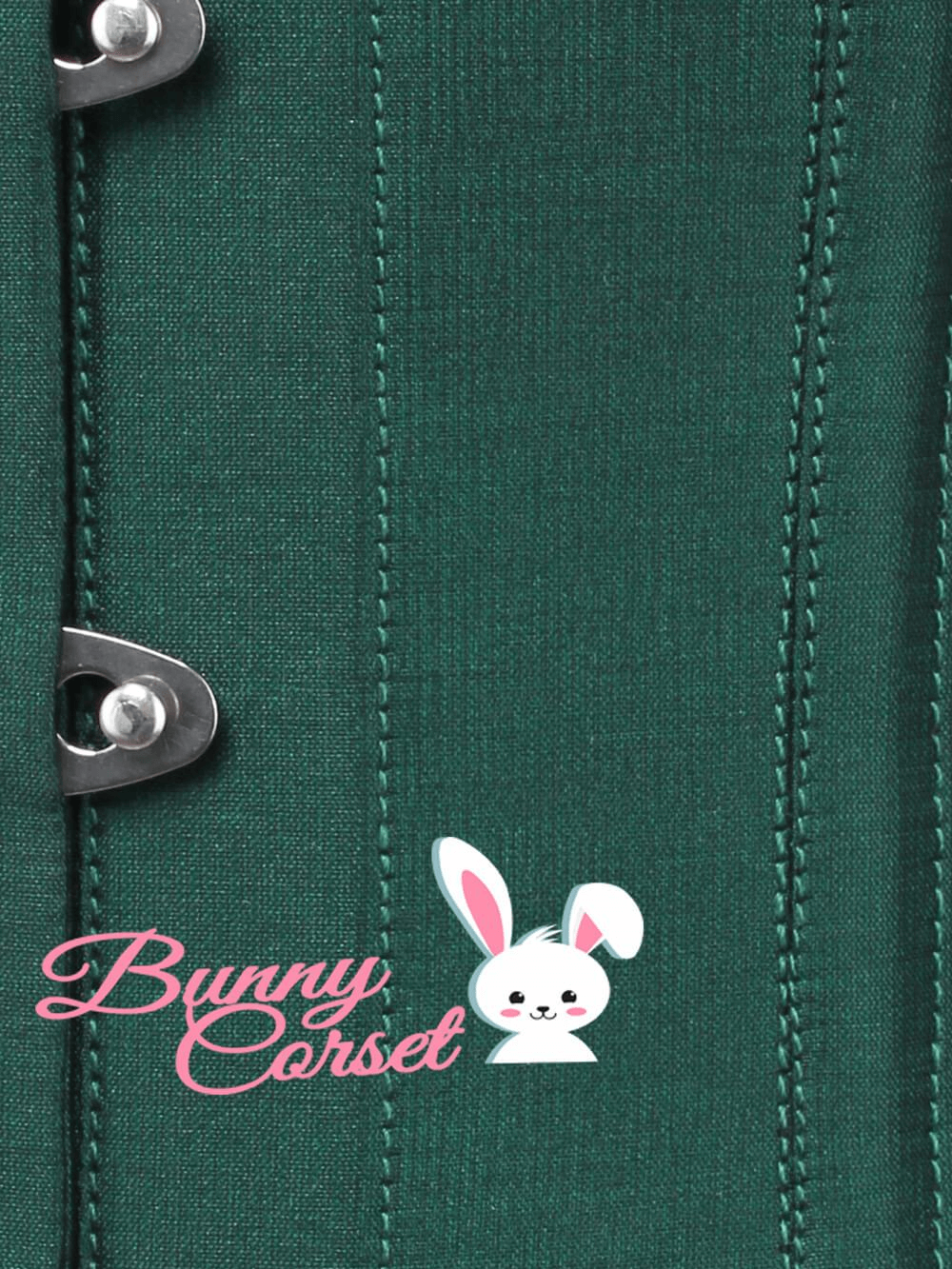 Close-up of a green taffeta underbust corset with metal busk and cute bunny logo.