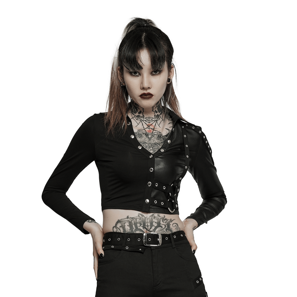 Chic black studded double-layer pullover top with sleek design and tattooed model showcasing edgy fashion.