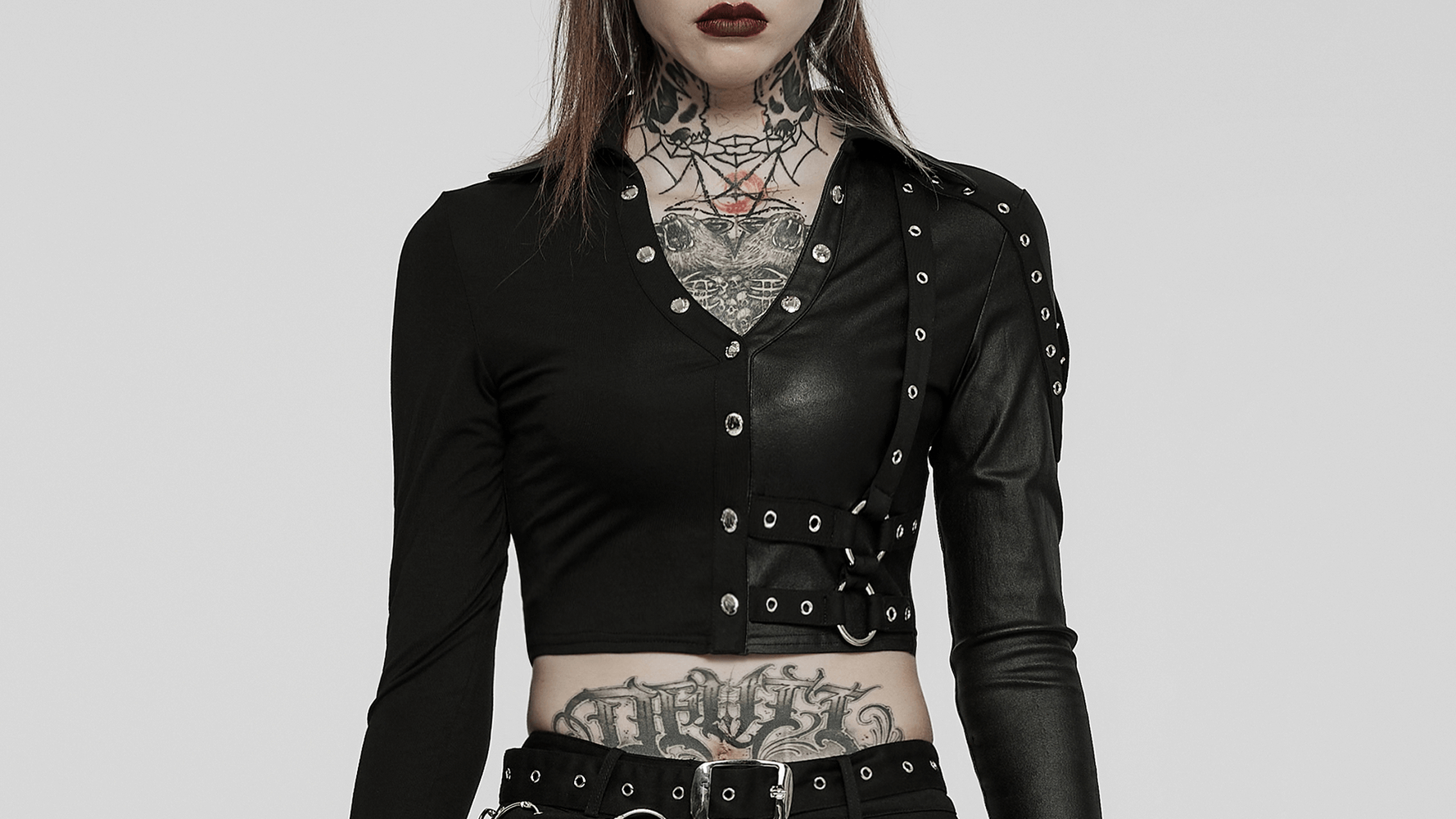 Women's stylish black double layer pullover top with studded detail and unique splicing design.