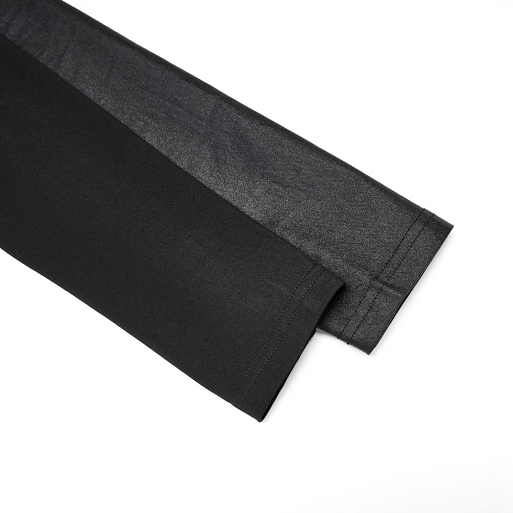 Close-up of two fabric sleeves in black and dark gray, showcasing texture for stylish pullover tops.
