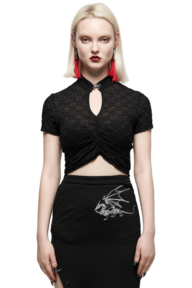 Dark translucent short sleeve crop top with knot buckle and hollow neckline, paired with a stylish skirt.