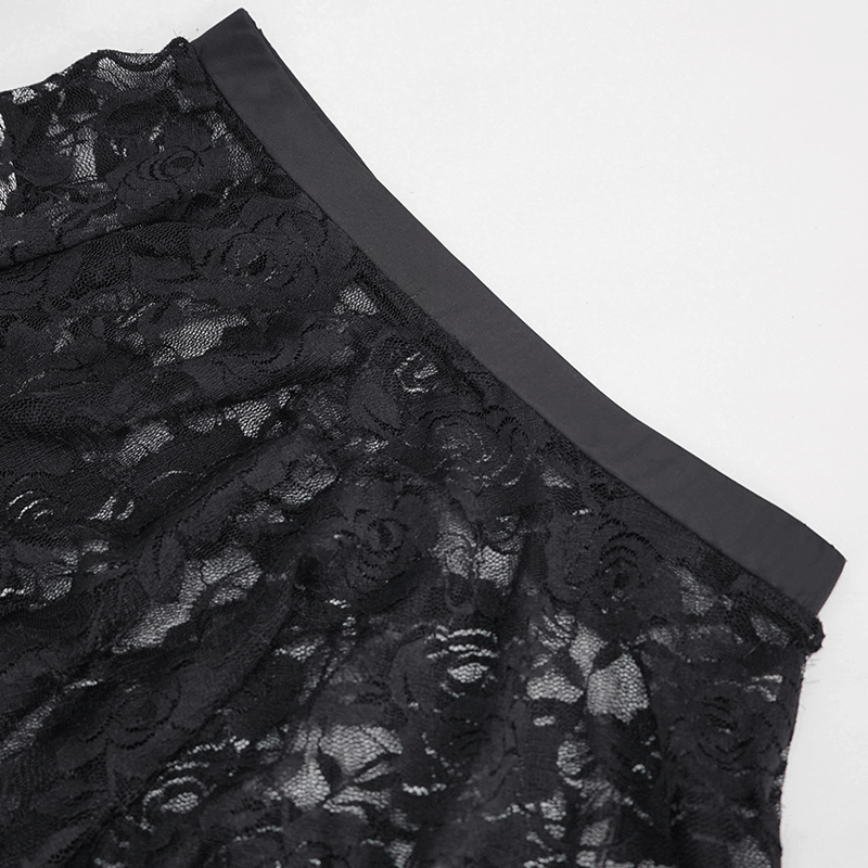 Close-up of women's black floral lace mini skirt, showcasing elegant rose pattern and smooth elastic waistband.