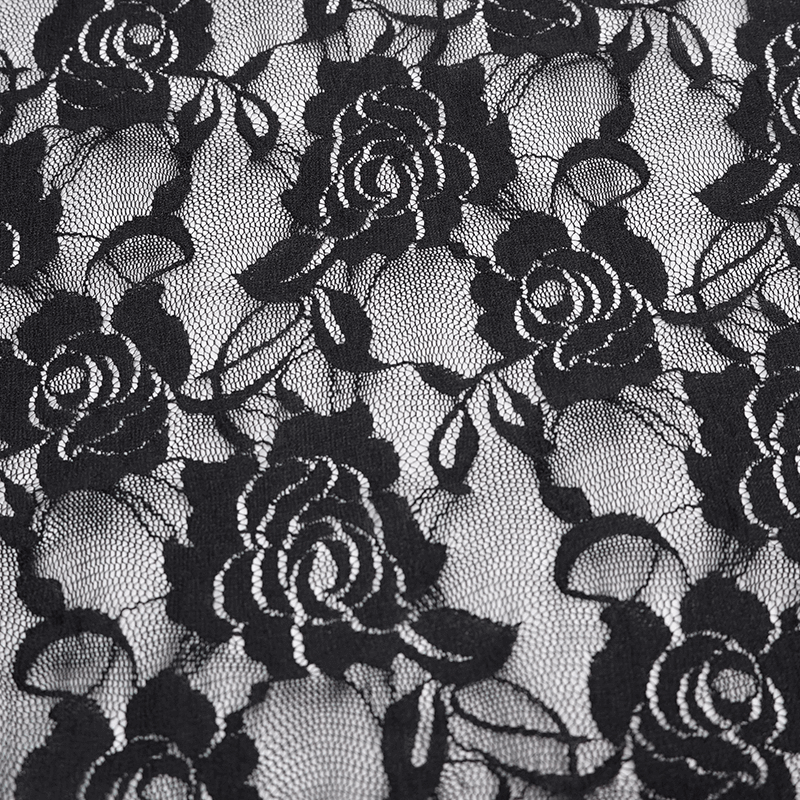 Close-up of elegant black floral lace fabric featuring intricate rose patterns, perfect for gothic style mini skirts.