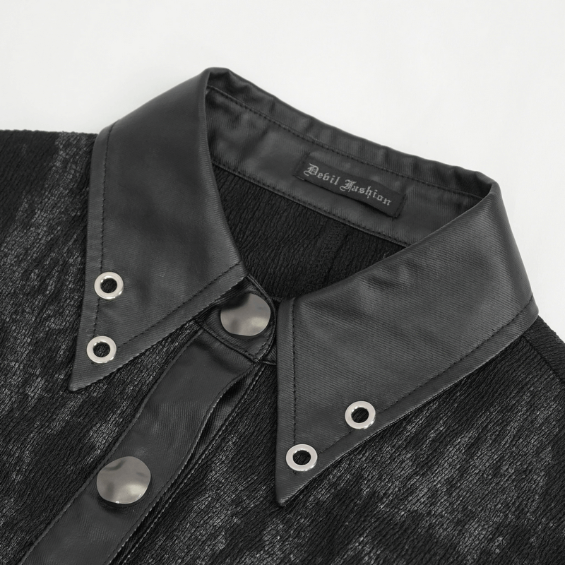 Close-up of a women's punk style turn-down collar black shirt with studs and edgy details.