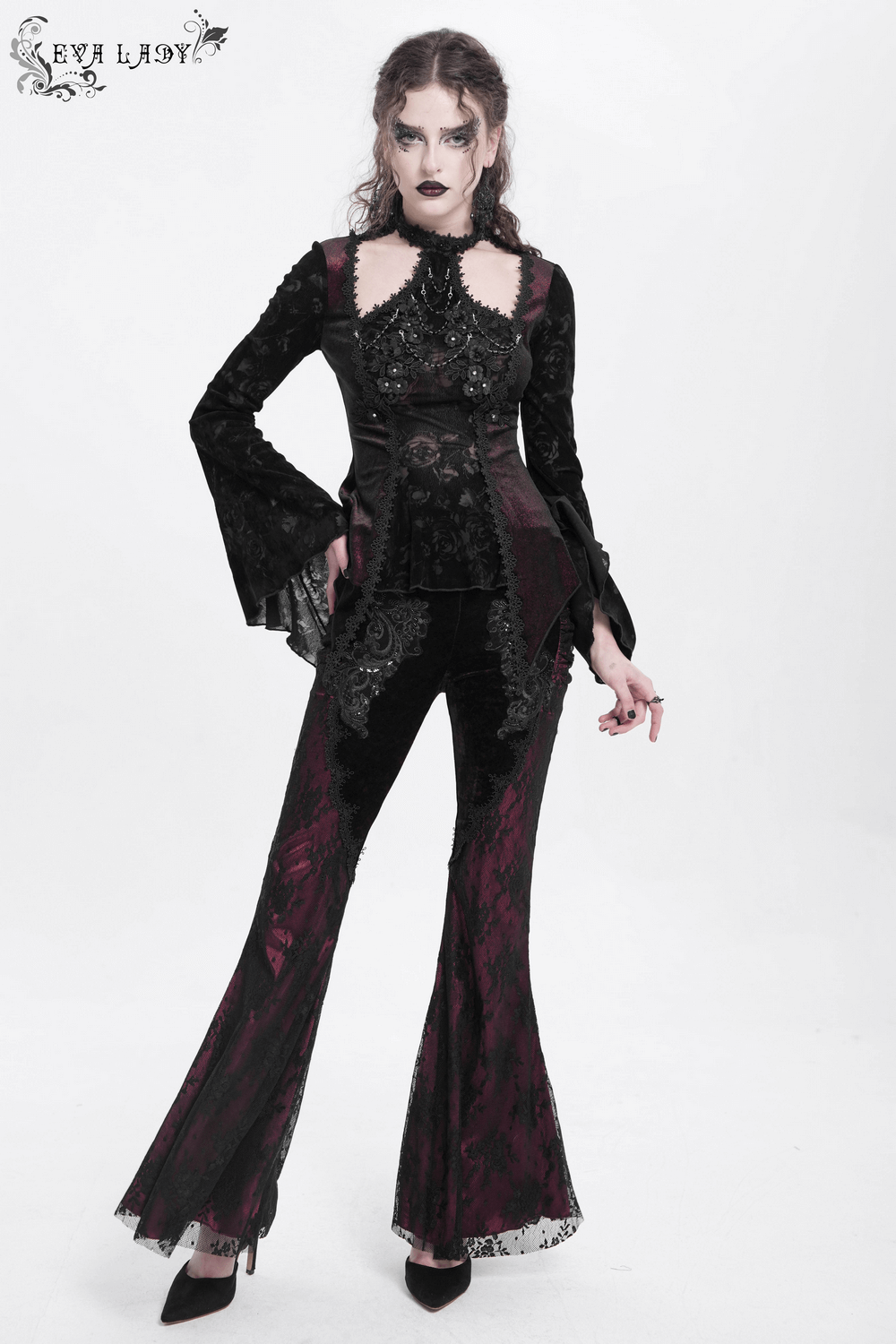 Gothic women's velvet flare pants with lace and embroidery for a dramatic, vintage-inspired look.