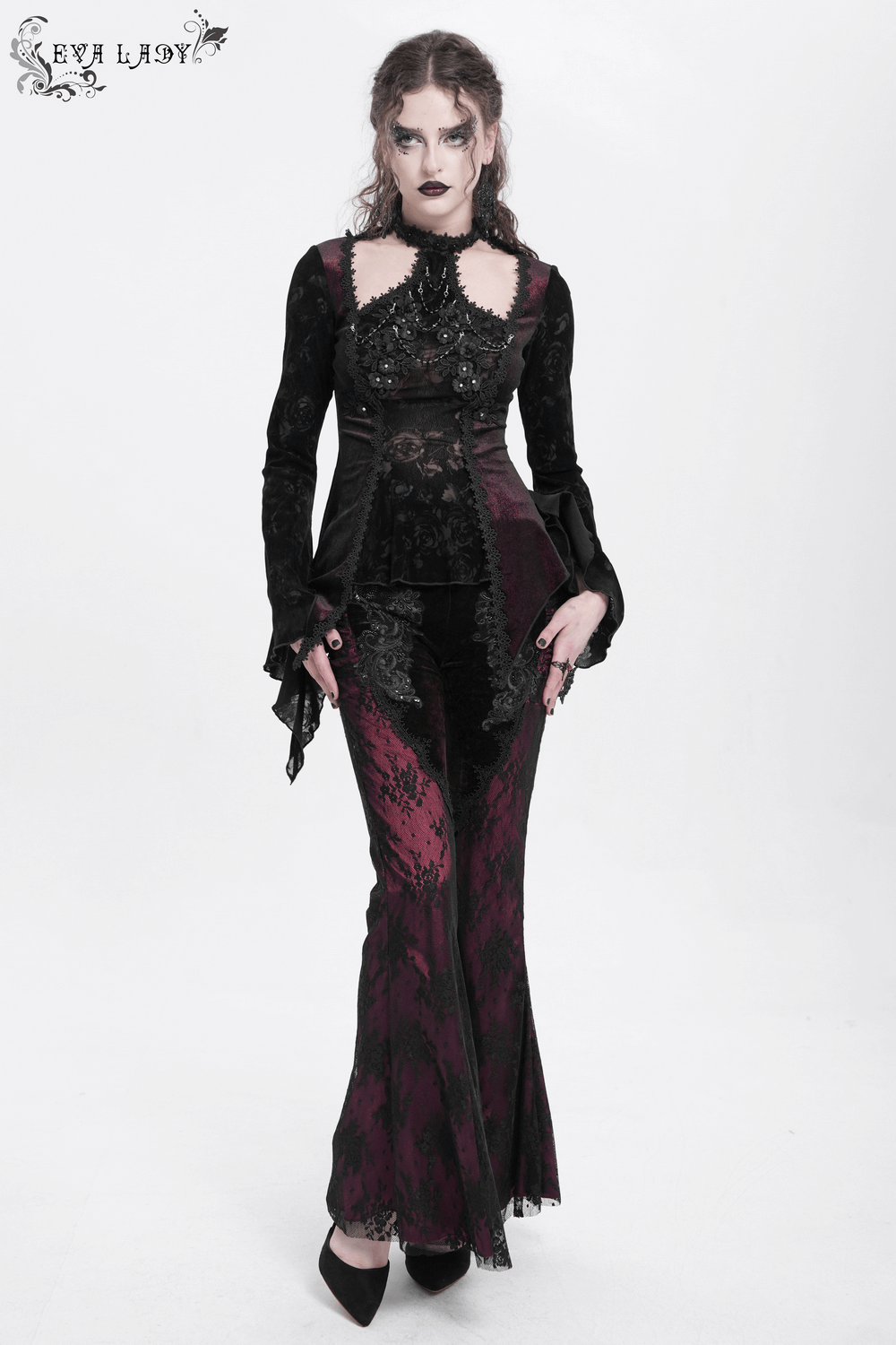 Women's gothic velvet flare pants with lace, paired with an elegant top, perfect for dark boho and witchy fashion.
