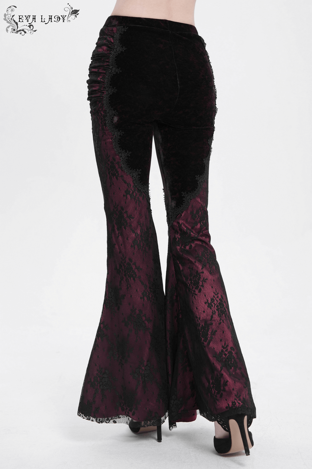 Women's dark boho velvet flare pants with lace and embroidery, featuring a dramatic silhouette and ruched details.