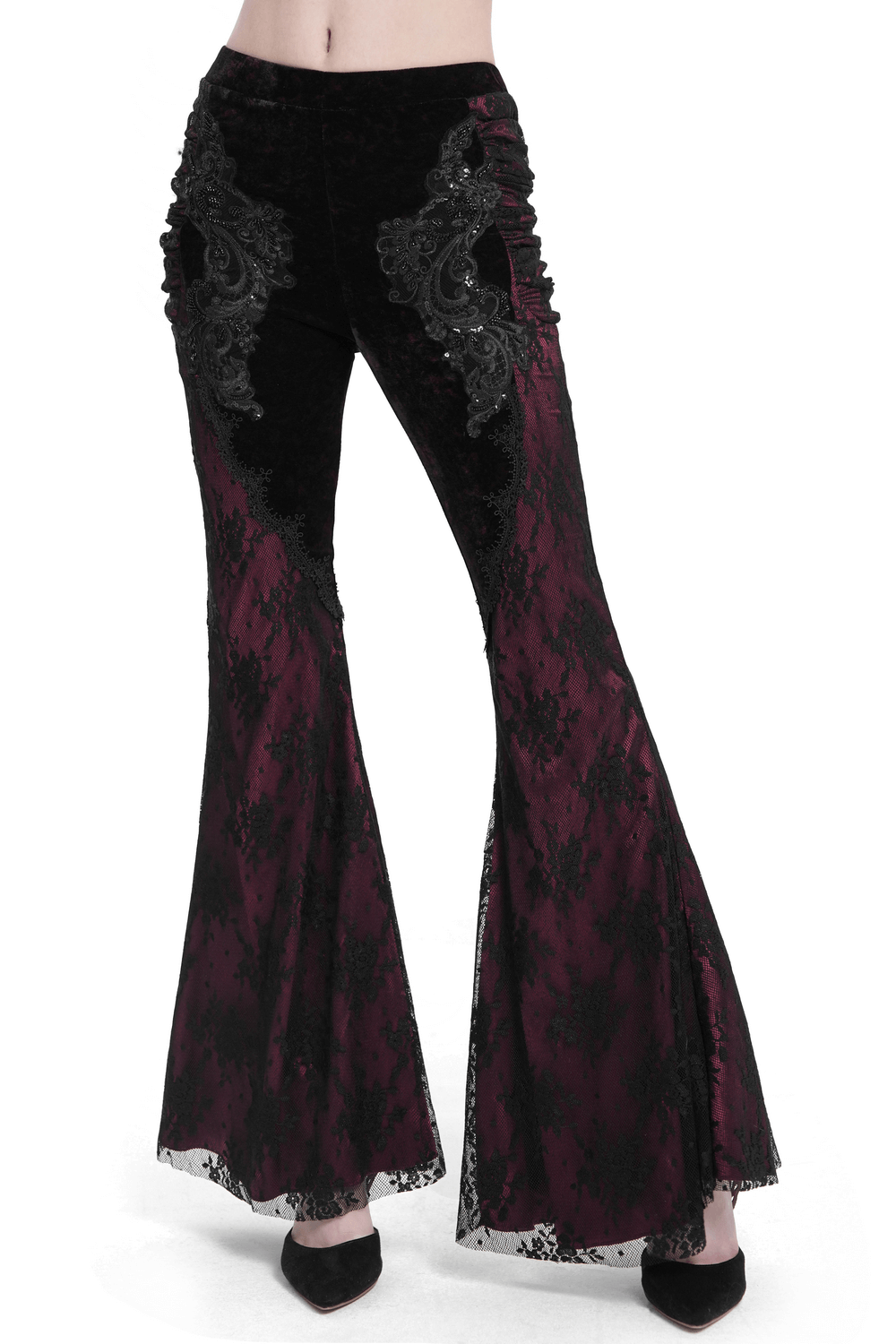 Dark boho velvet flare pants with lace and appliques, perfect for gothic fashion and bold statement styling.