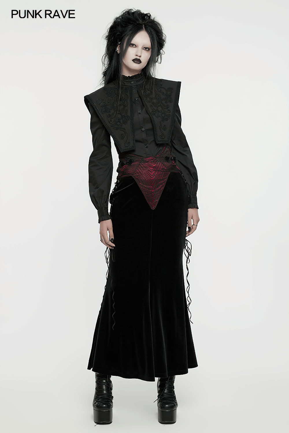Black velvet gothic fishtail skirt with drawstrings and a stylish top, showcasing stunning gothic elegance.