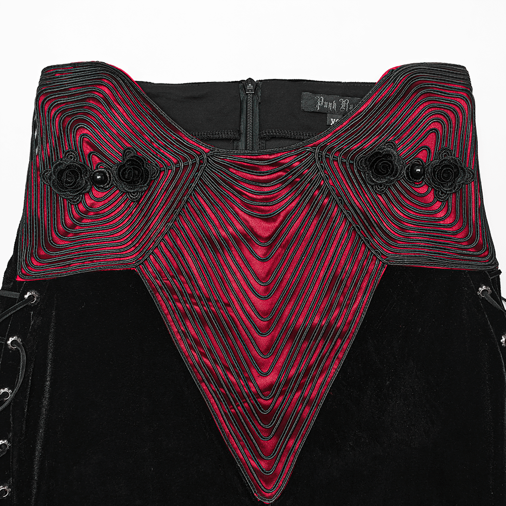 Close-up of black velvet gothic fishtail skirt featuring burgundy embroidery and 3D rose buckles, showcasing elegant design.