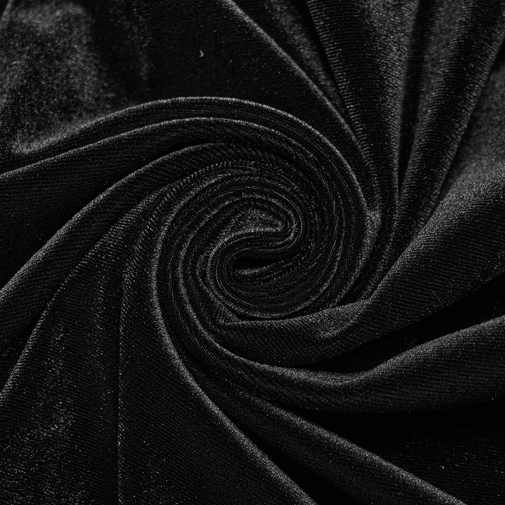 Close-up of luxurious black velvet fabric, showcasing its soft and rich texture for gothic fashion designs.
