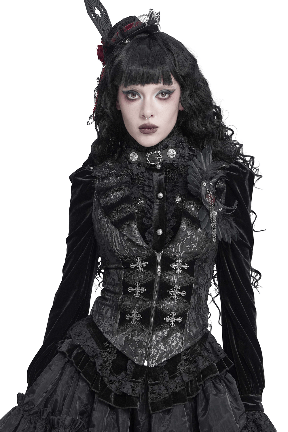 Women's Victorian Brocade Waistcoat with Cross Details modeled by a dark gothic woman with styled black hair.