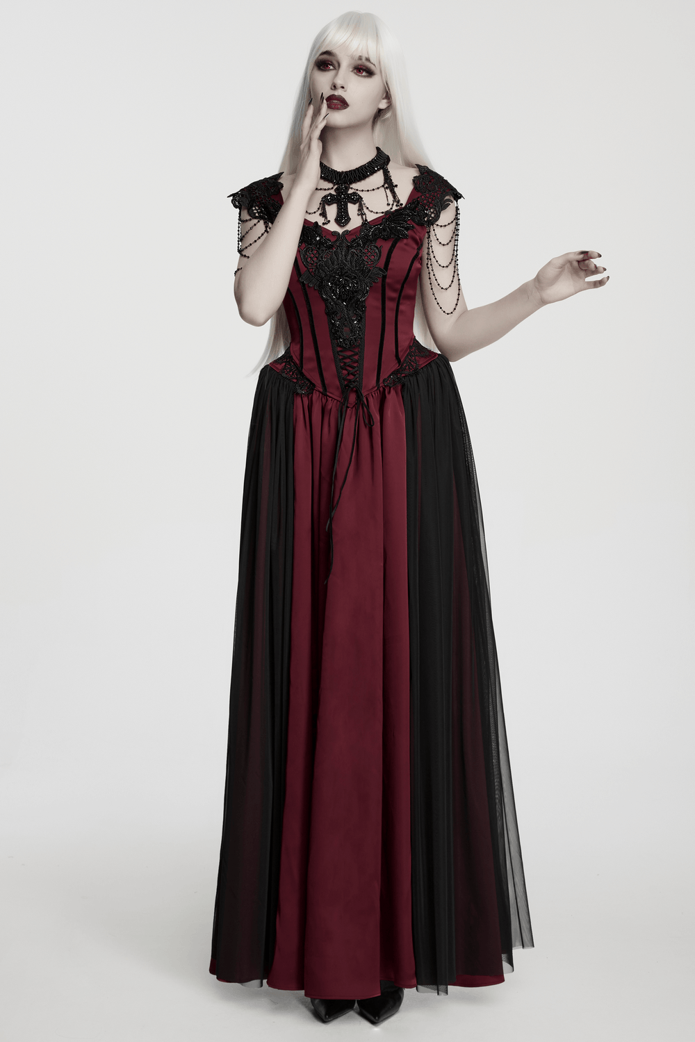 Women's Victorian Gothic Lace and Velvet Dress with corset bodice and fishbone-supported skirt.