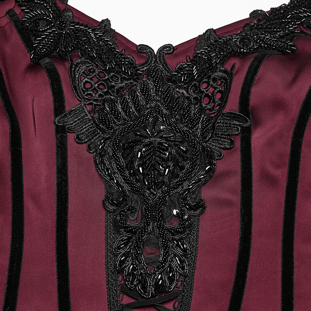 Elegant detailing of Women's Victorian Gothic Lace and Velvet Dress featuring black embroidery and velvet fabric.