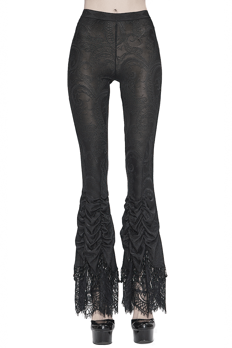 Women's vintage gothic black flared trousers with lace trim, perfect for alternative fashion enthusiasts.