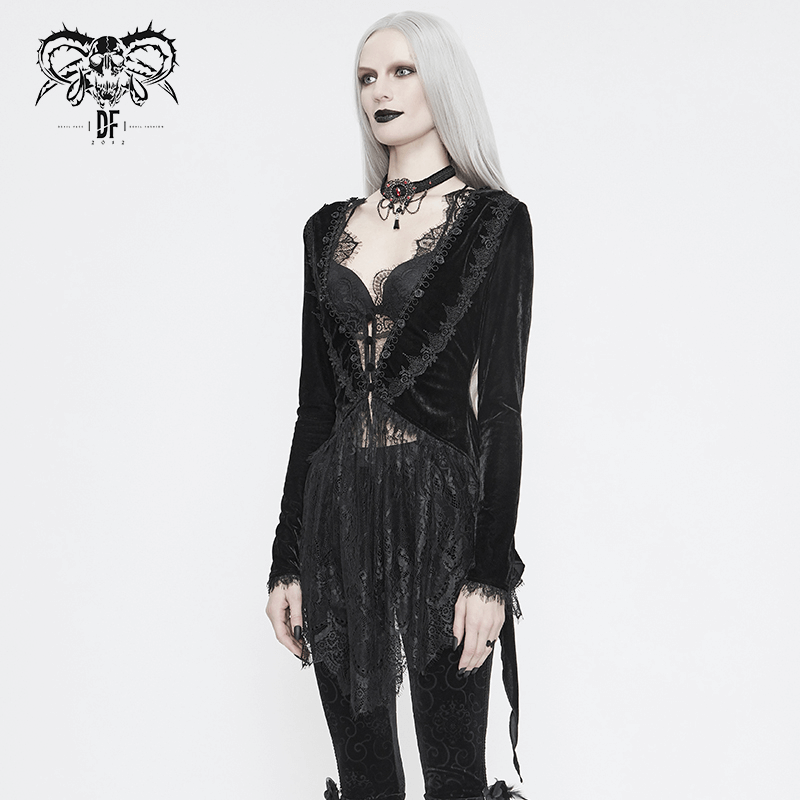 Woman in black velvet and lace gothic cape showcasing vintage style fashion look.