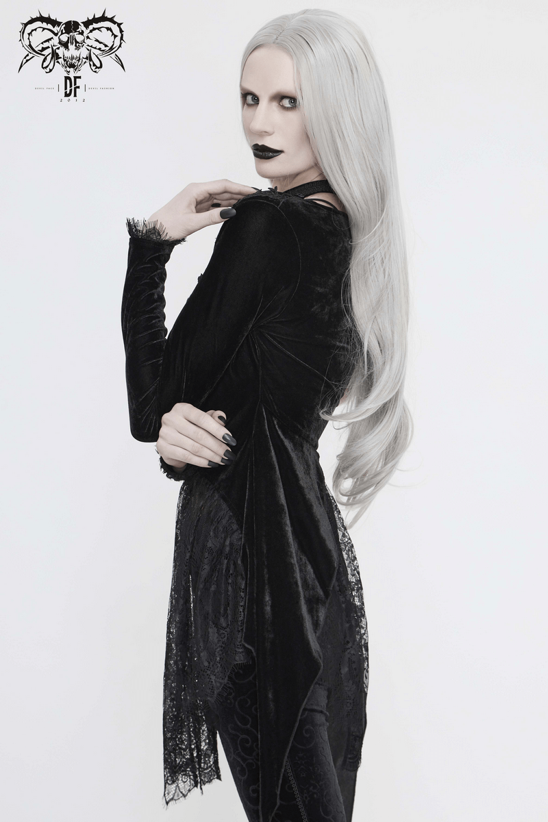 Model showcasing a women's vintage gothic black velvet and lace cape, exuding elegance and style.