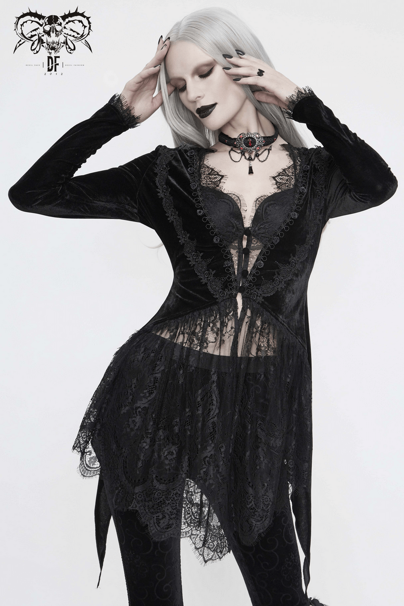 Stylish model in a women's vintage gothic black velvet and lace cape, exuding grace and elegance.