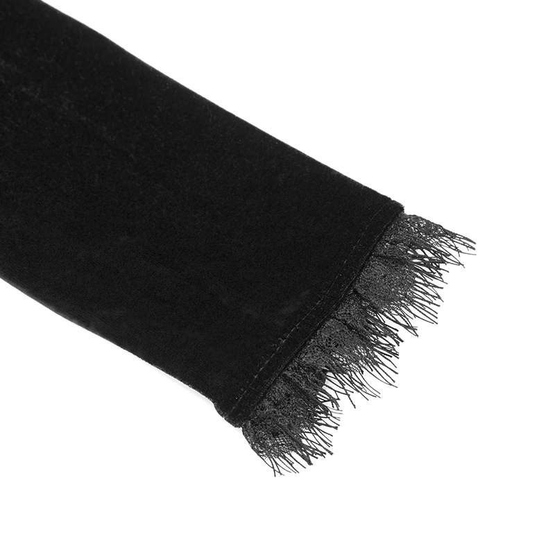 Close-up of the delicate lace trim on a women's gothic black velvet cape sleeve.
