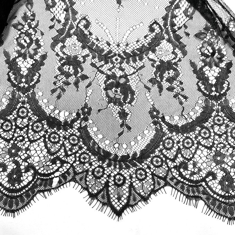 Close-up of intricate black lace detailing, perfect for a vintage gothic look.
