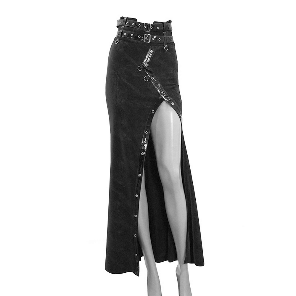 Women's vintage long black skirt with straps, rivets, and a thigh-high slit, perfect for steampunk fashion.