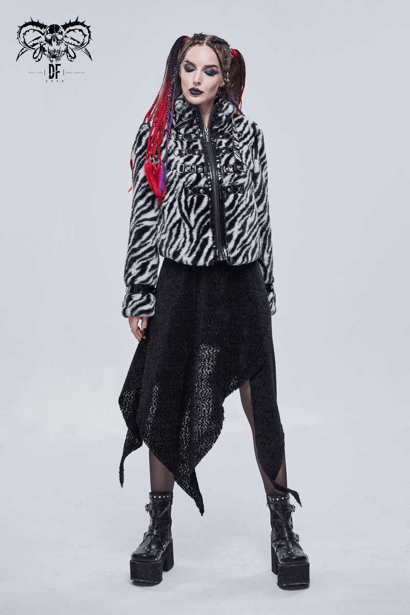 Stylish woman in a zebra-stripe faux fur jacket, layered with a black asymmetrical skirt, showcasing alternative fashion.