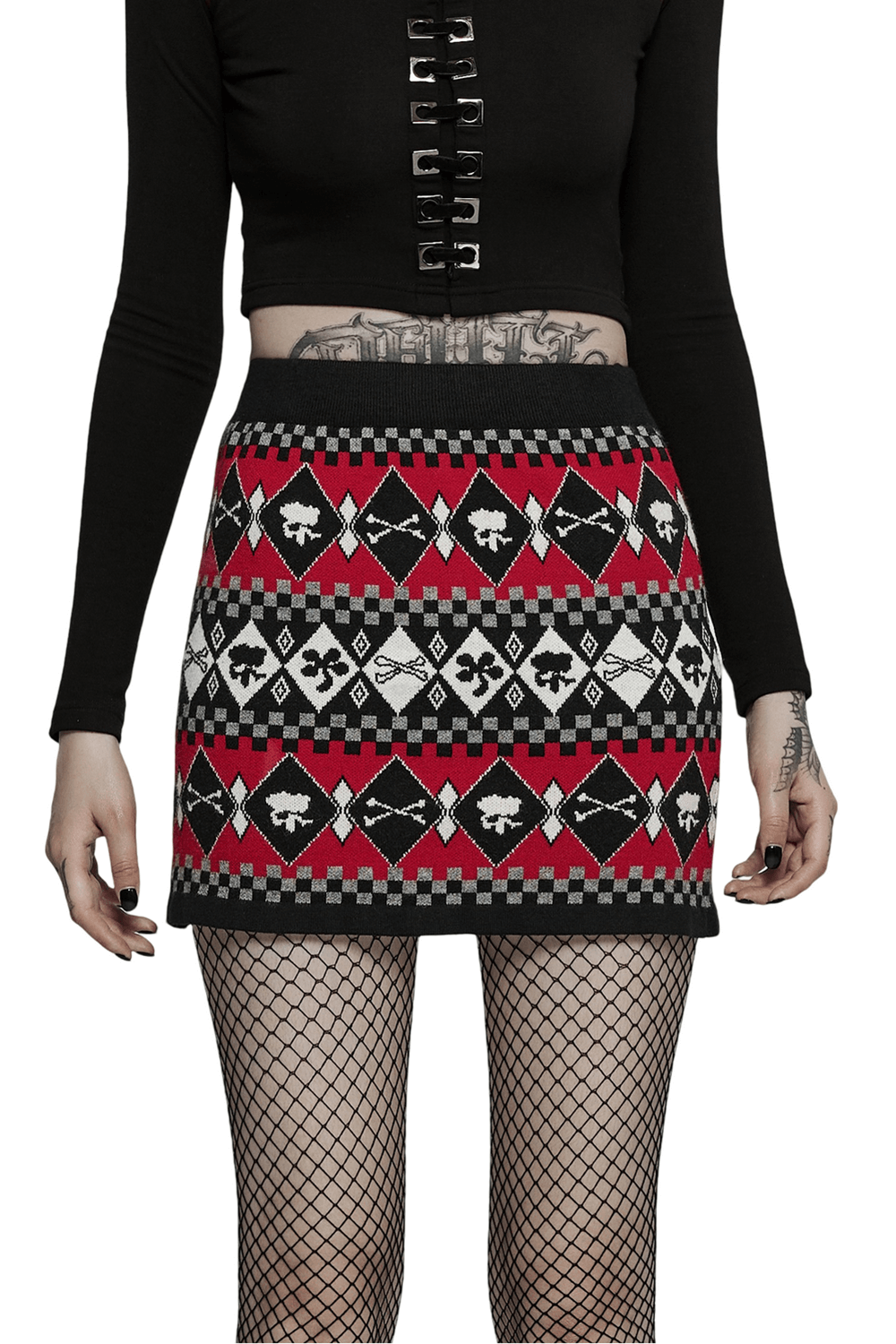 Wool-blend knit skirt with geometric skull design in red and black, styled with fishnet tights.