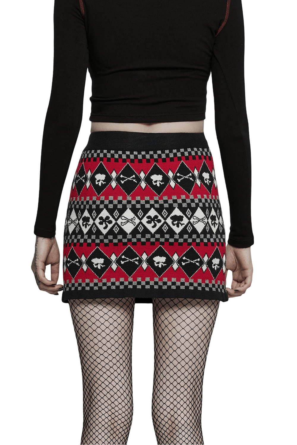 Back view of a wool-blend knit skirt with geometric skull design in red, black, and white patterns.