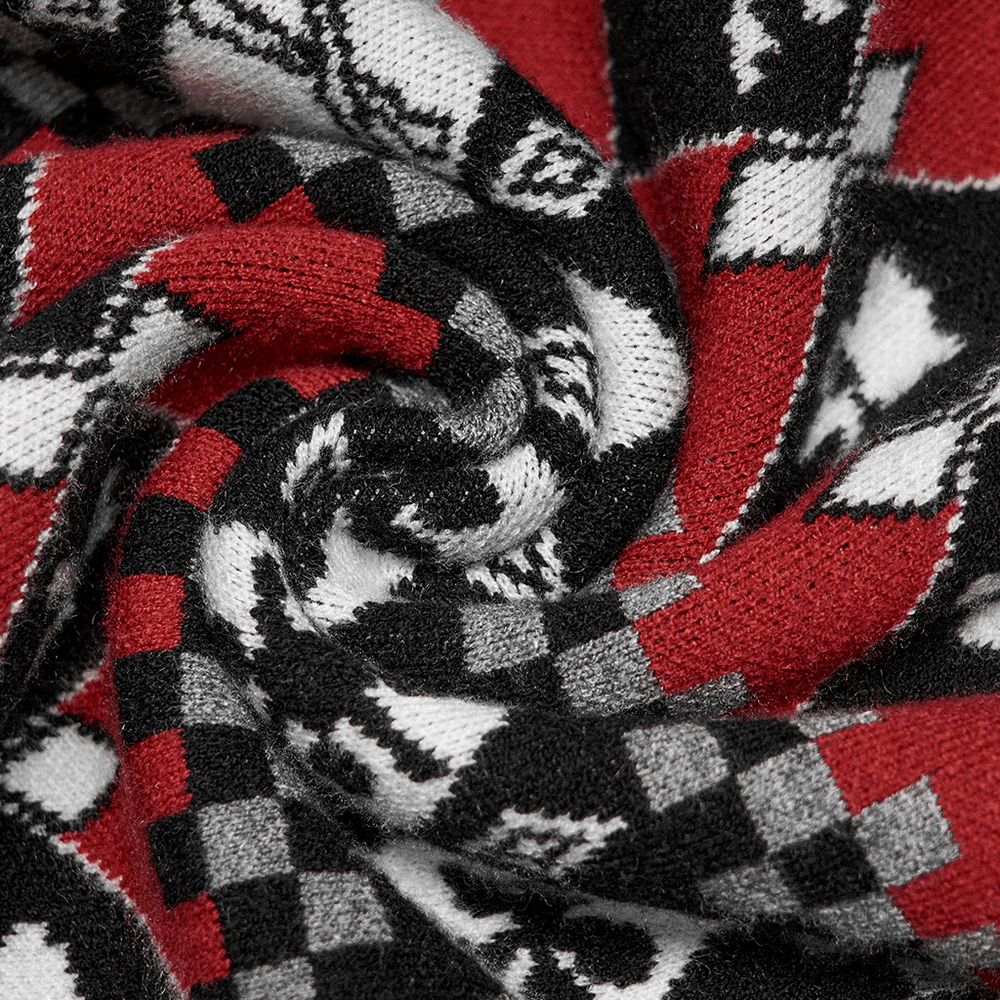 Close-up of cozy wool-blend fabric with bold red, black, and white geometric skull pattern for stylish skirts.