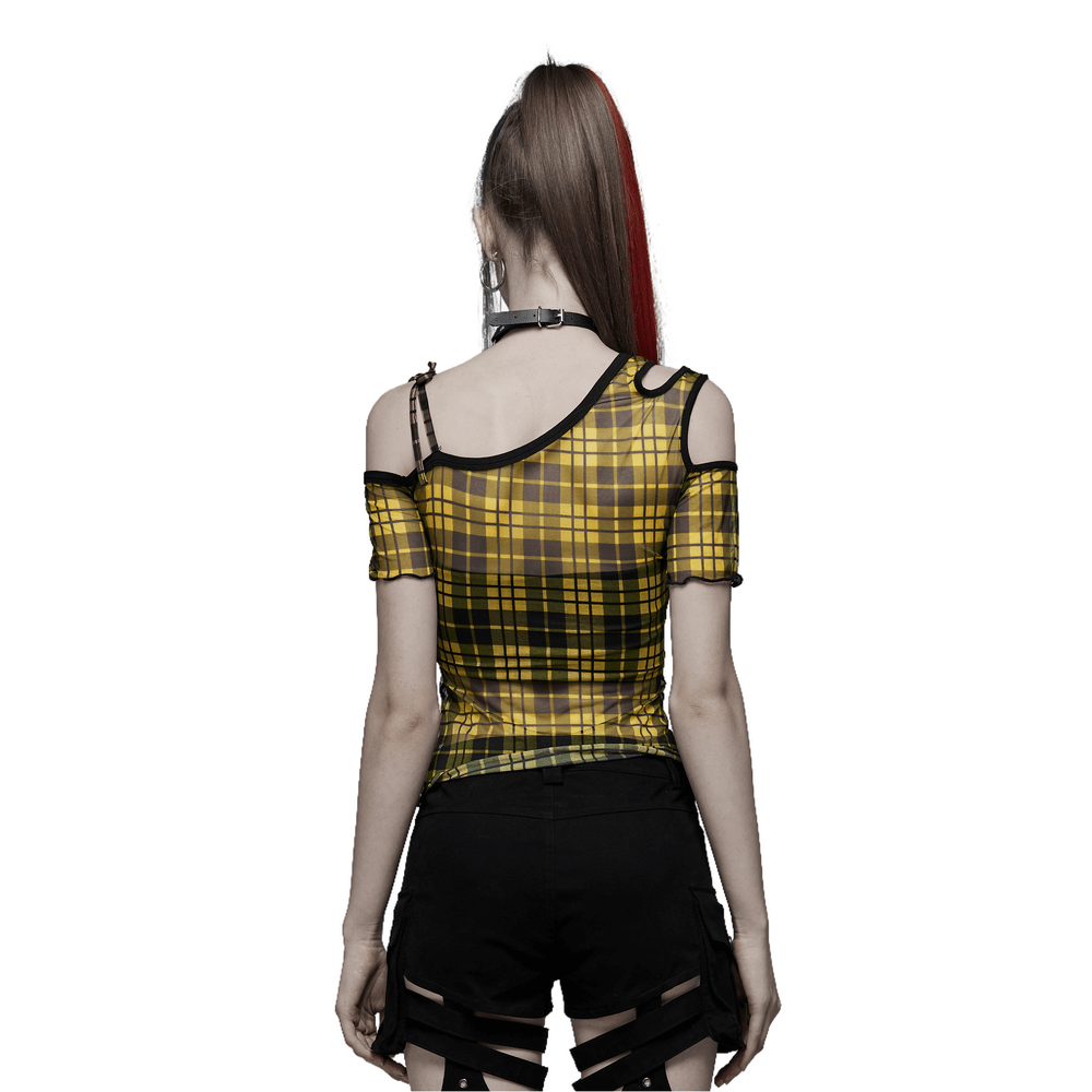 Woman wearing a yellow plaid mesh punk T-shirt with asymmetric neckline, featuring a stylish black trim.